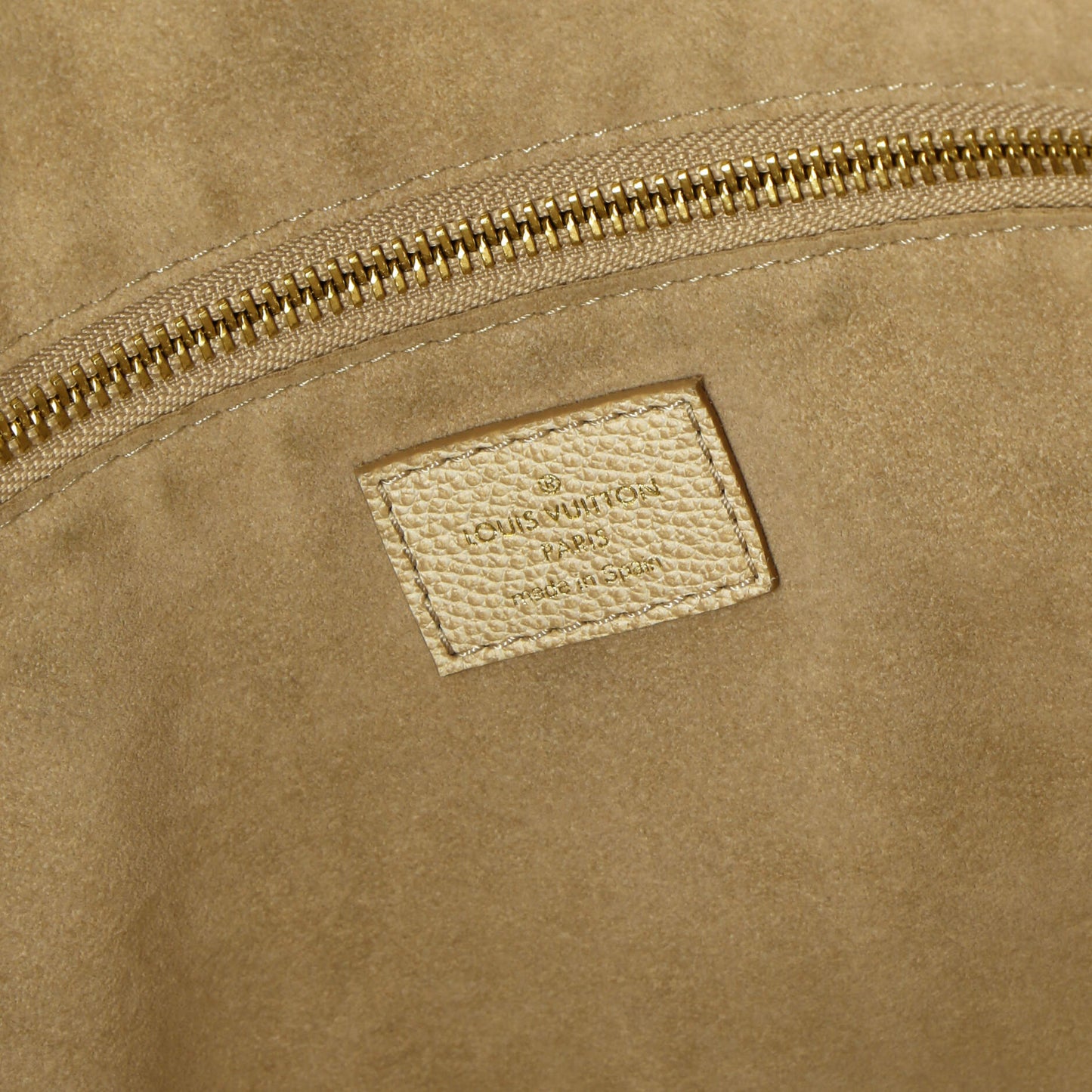 Neverfull NM Tote Stardust Monogram Empreinte Leather MM