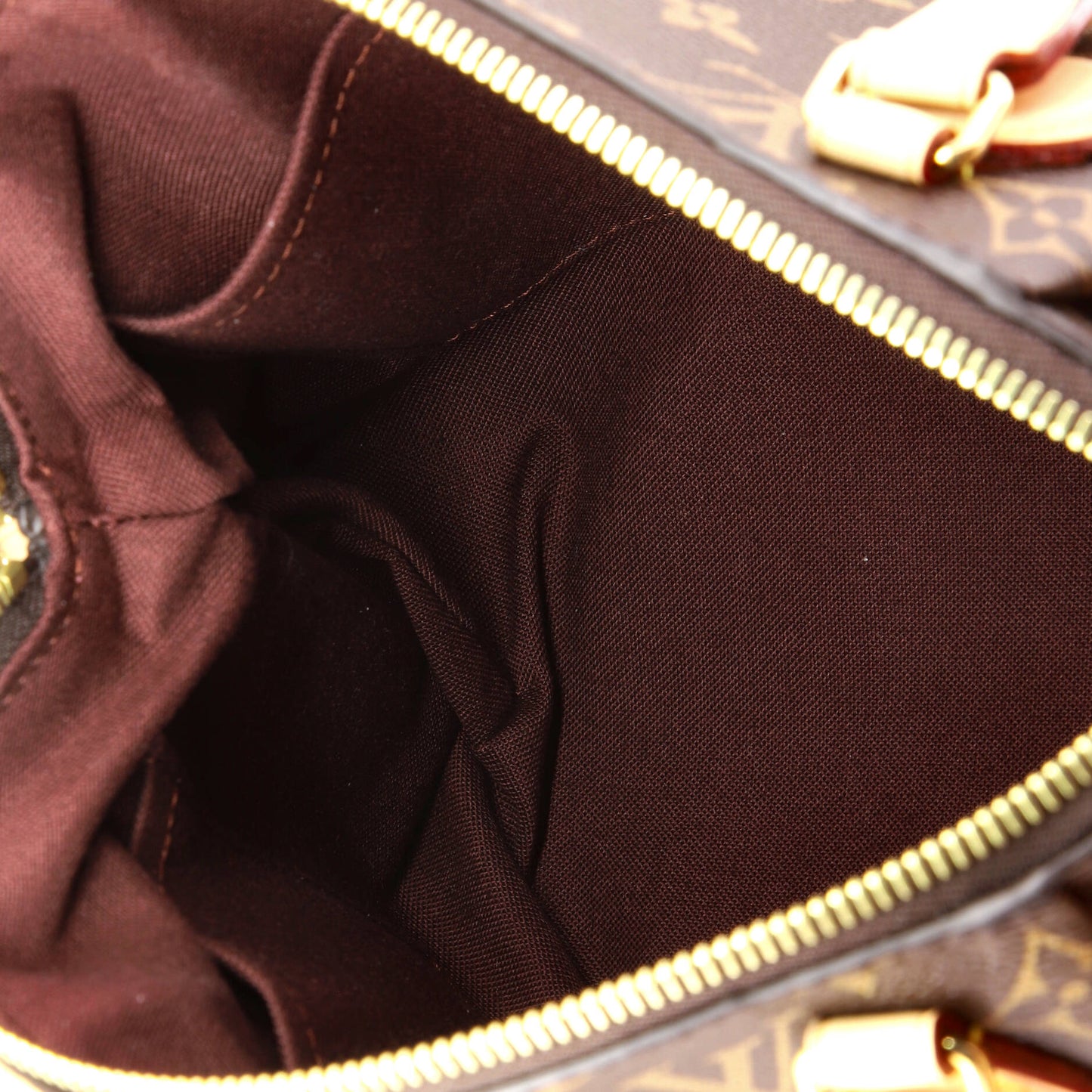 Rivoli Handbag Monogram Canvas PM