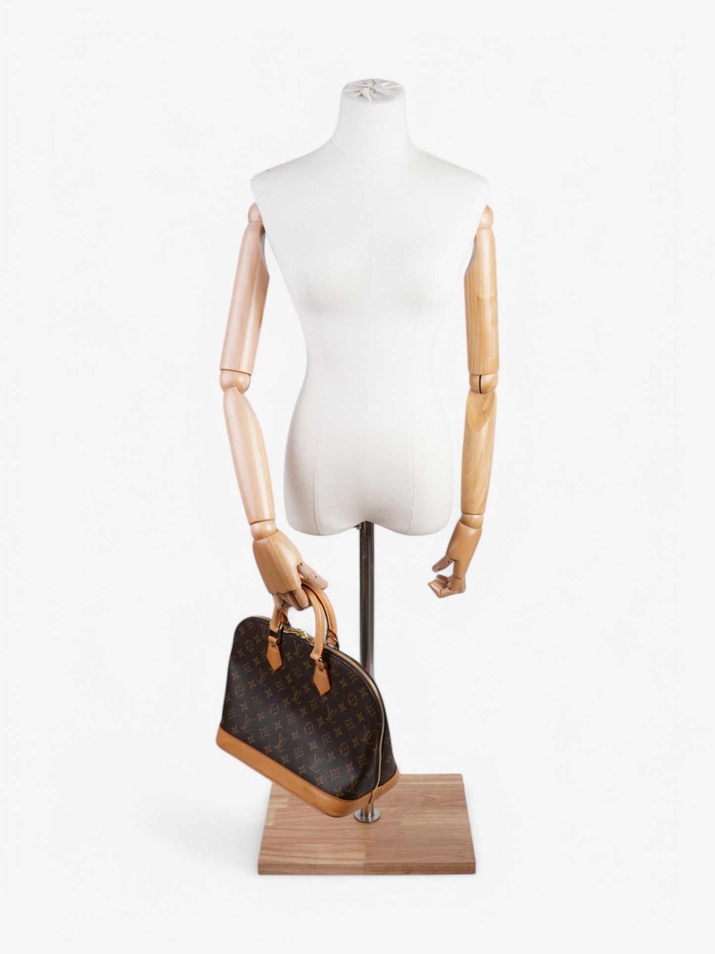 Louis Vuitton Alma Monogram Coated Canvas PM
