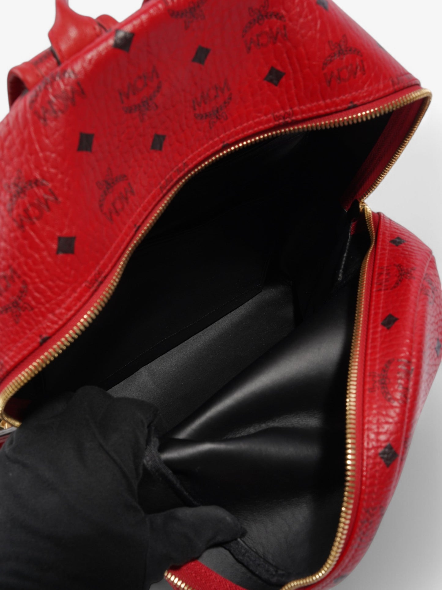 MCM Stark Visetos Monogram Stud Backpack Red / Black Leather