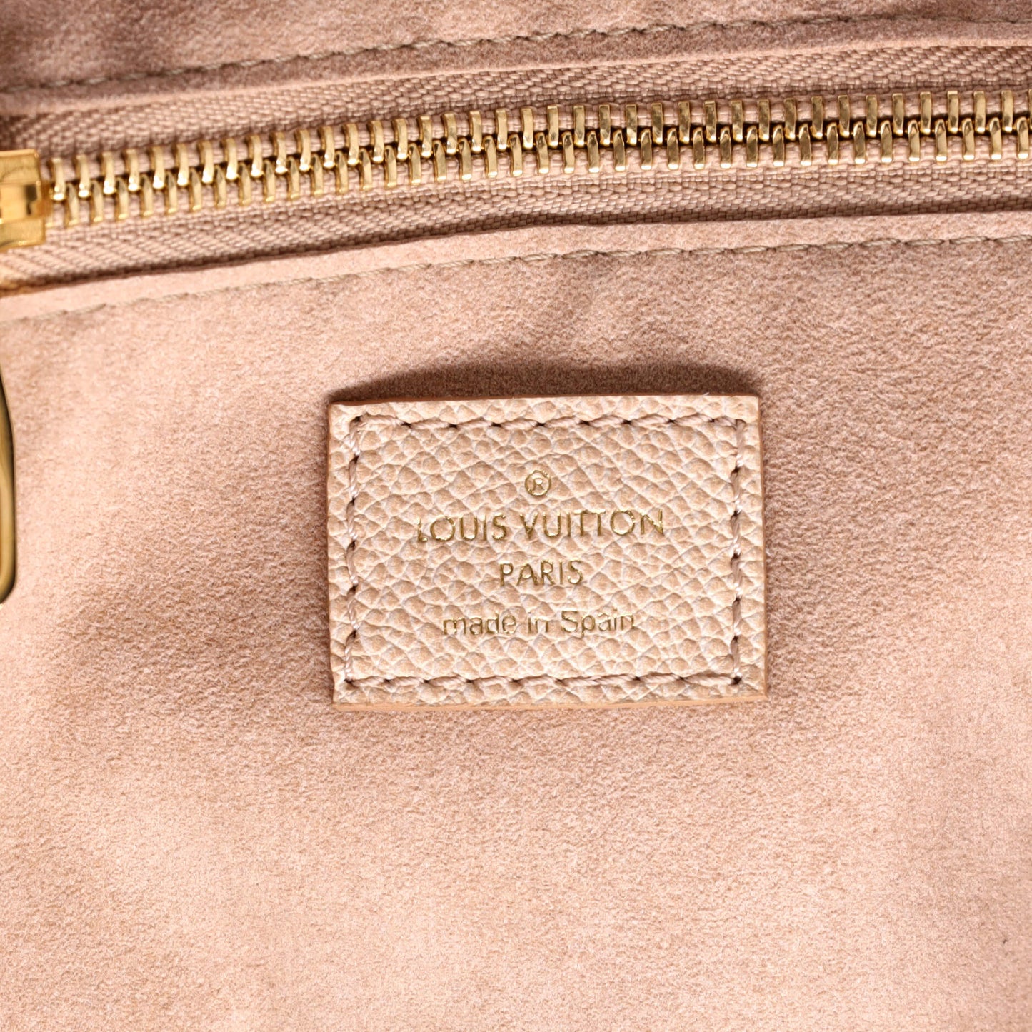 Neverfull NM Tote Stardust Monogram Empreinte Leather MM